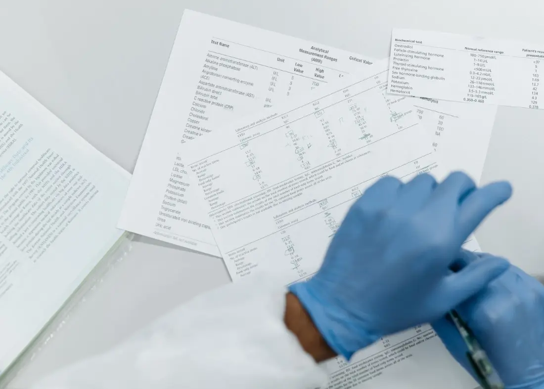 Printed lab test results being reviewed