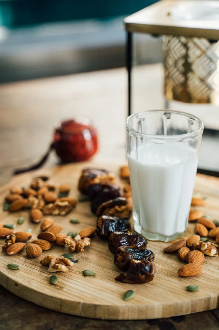 Dates, almonds, walnuts and a glass of milk, calorie dense everyday foods for healthy weight gain